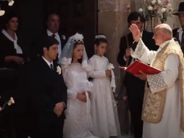 Simonetta Stefanelli as Apollonia and Al Pacino as Michael during a church wedding in The Godfather
