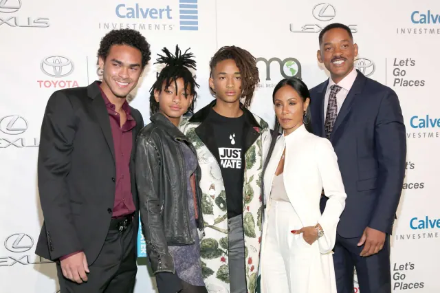 Will and Jada Pinkett Smith with family members at an event