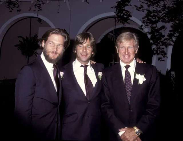 Lloyd Bridges with sons Jeff and Beau in an older formal event photograph