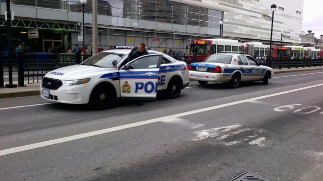 Police vehicles used as an illustration, not the Chamberlain collision scene