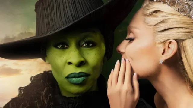 Glinda (Ariana Grade) whispering to Elphaba (Cynthia Erivo) in 