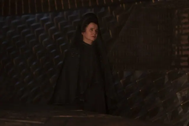 Emily Watson as Valya in a dark setting