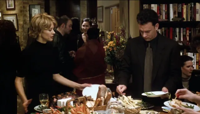 Tom Hanks and Meg Ryan loading up their plates at a lavish house party in 1998