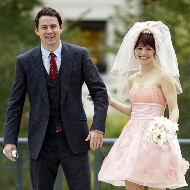 Rachel McAdams as Paige wearing a short pink bridal dress beside Channing Tatum as Leo