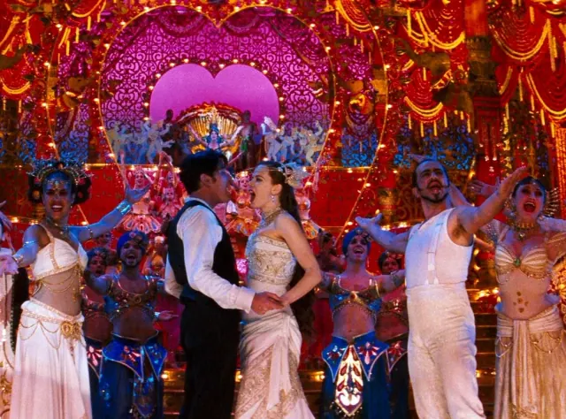 Nicole Kidman as Satine amid dancers in the theatrical finale of Moulin Rouge!