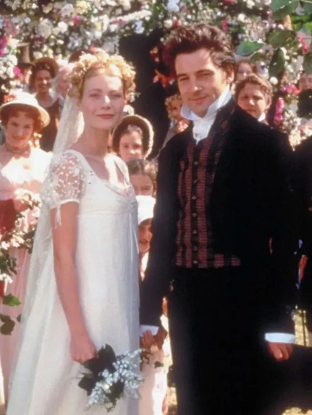 Gwyneth Paltrow as Emma wearing a high-waisted bridal dress beside Jeremy Northam