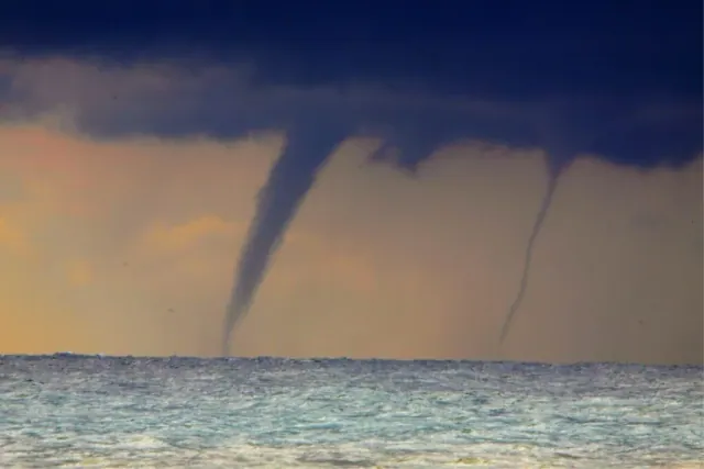 A waterspout at sea, used as an illustration
