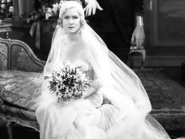 Mae Clarke as Elizabeth in a lace bridal gown and long veil in Frankenstein