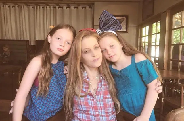 Lisa Marie Presley with her twin daughters Harper and Finley