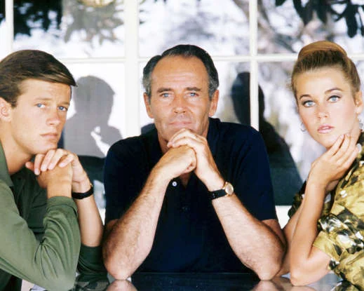 Henry Fonda seated between his children Peter and Jane in an archive portrait